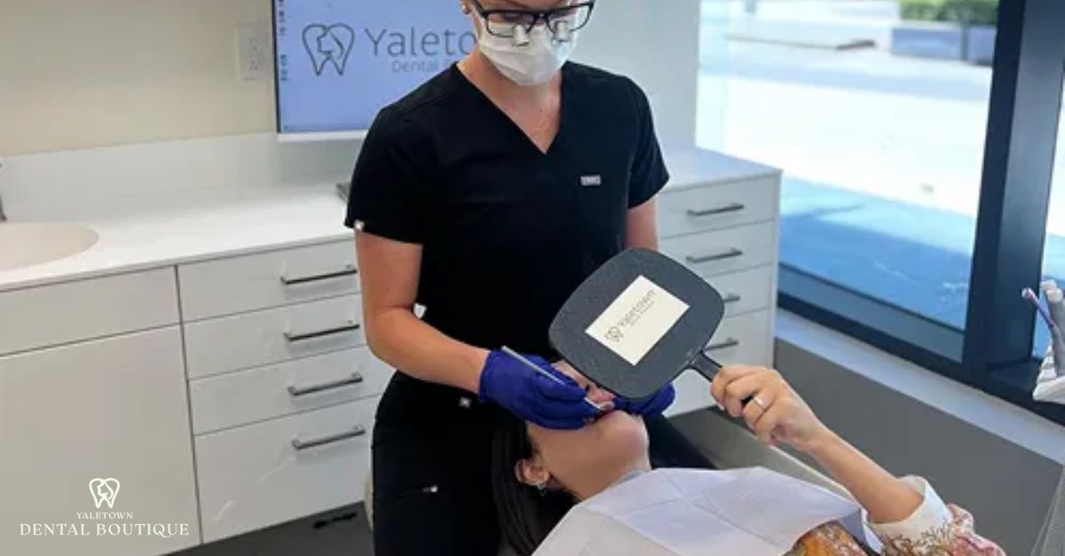 Close-up of dental consultation highlighting gum graft surgery at Yaletown Dental Boutique.